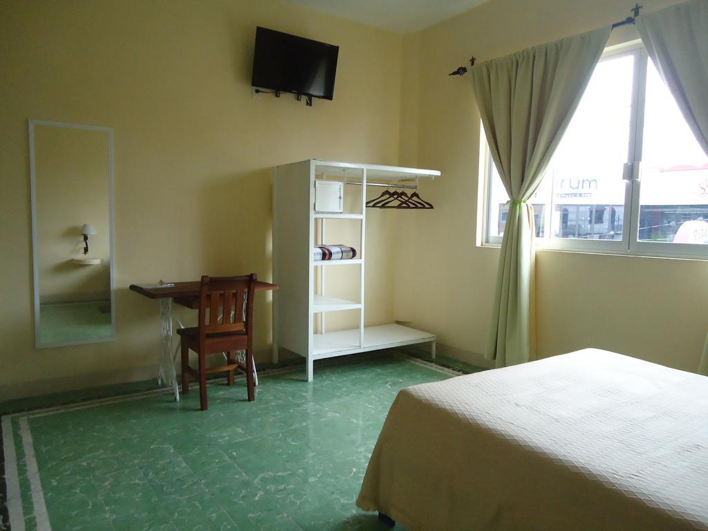 Hotel Suites Córdoba Quarto foto